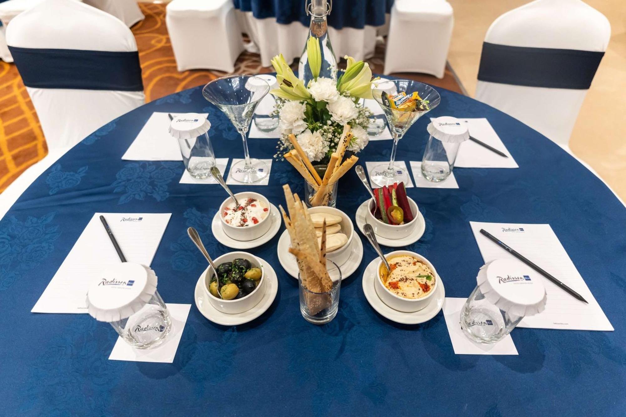 Radisson Blu Hotel, Greater Noida Exteriér fotografie A table set for a meeting